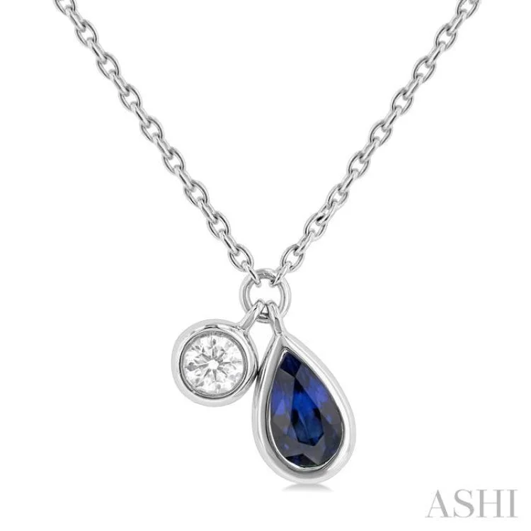 1/50 ctw Pear Cut 5X3MM sapphire and Bezel Set Round Cut Diamond Precious Necklace in 10K White Gold