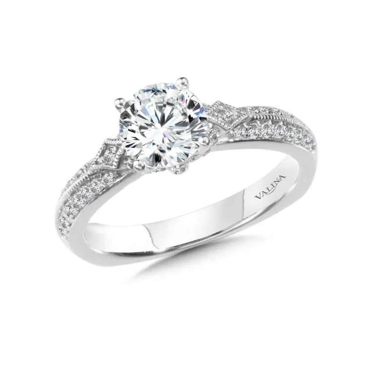 Diamond engagement ring mounting with side stones set in 14k white gold.