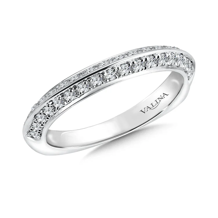 True fit matching diamond wedding band and a beautiful reminder of that special day for years to come.