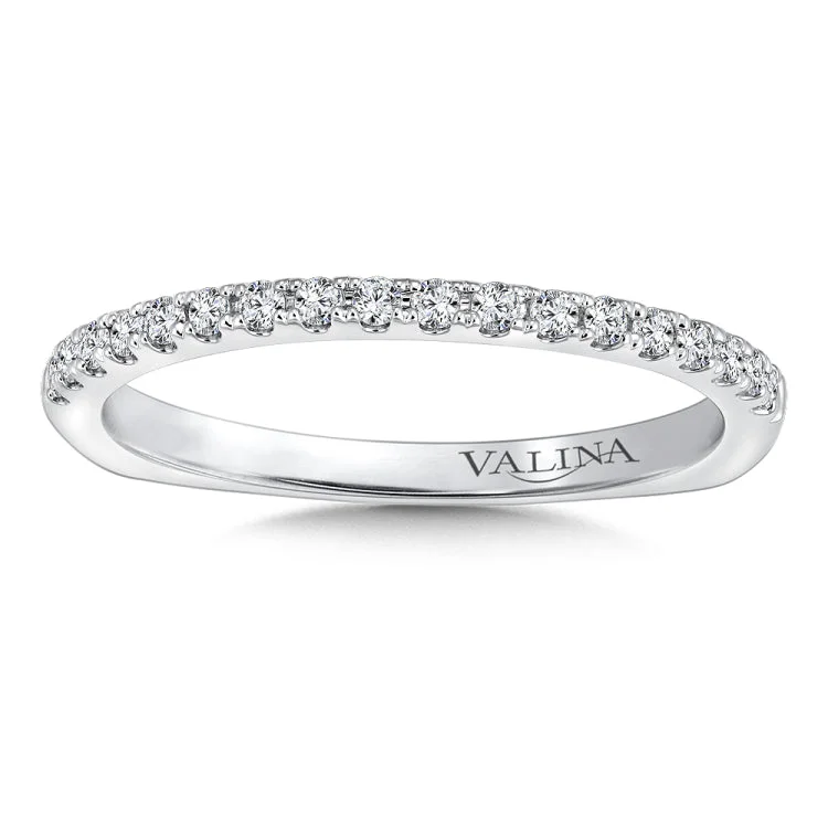 True fit matching diamond wedding band and a beautiful reminder of that special day for years to come.