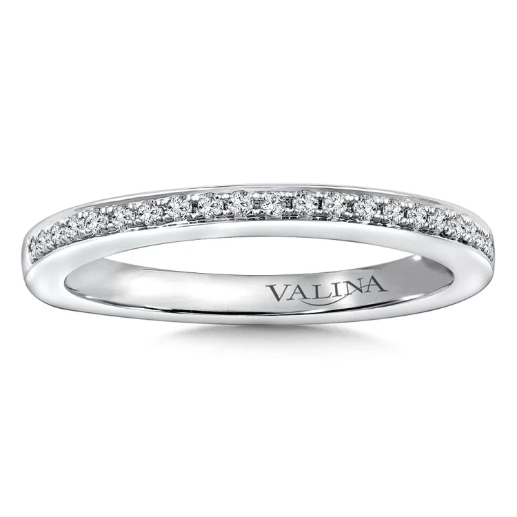 True fit matching diamond wedding band and a beautiful reminder of that special day for years to come.