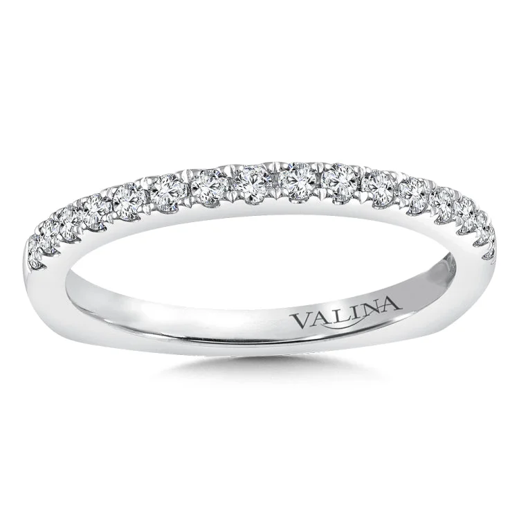 True fit matching diamond wedding band and a beautiful reminder of that special day for years to come.