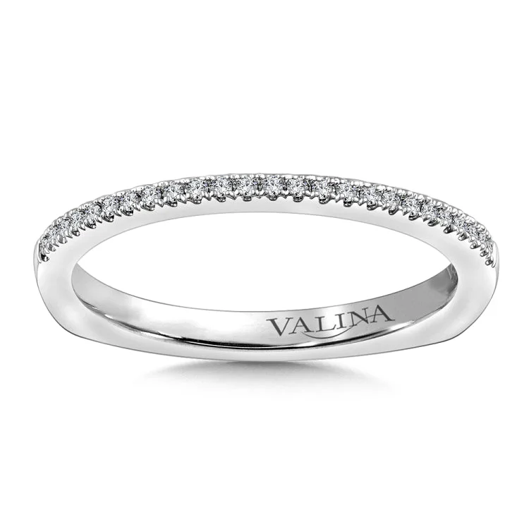 True fit matching diamond wedding band and a beautiful reminder of that special day for years to come.