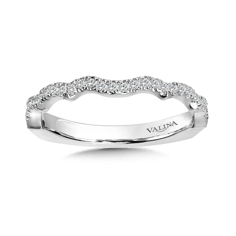 True fit matching diamond wedding band and a beautiful reminder of that special day for years to come.